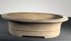 Seibun unglazed oval bonsai pot, front profile