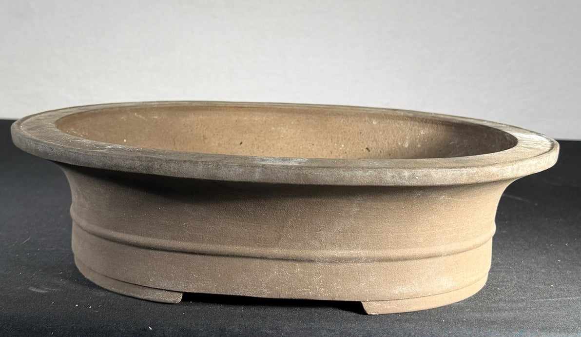Seibun unglazed oval bonsai pot, front profile