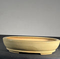 Hattori cream glazed oval bonsai pot front profile