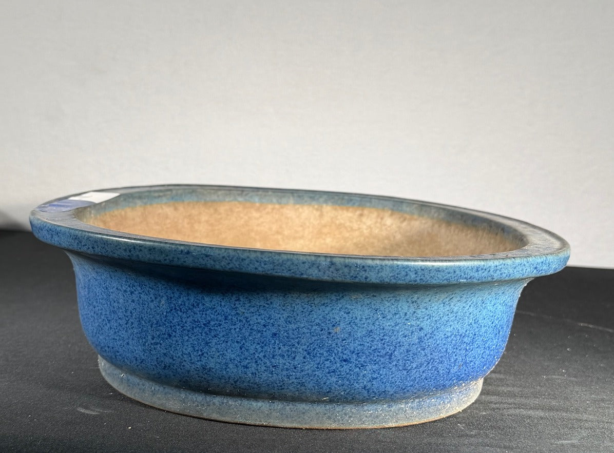 Reiho blue speckled oval bonsai pot three quarter view