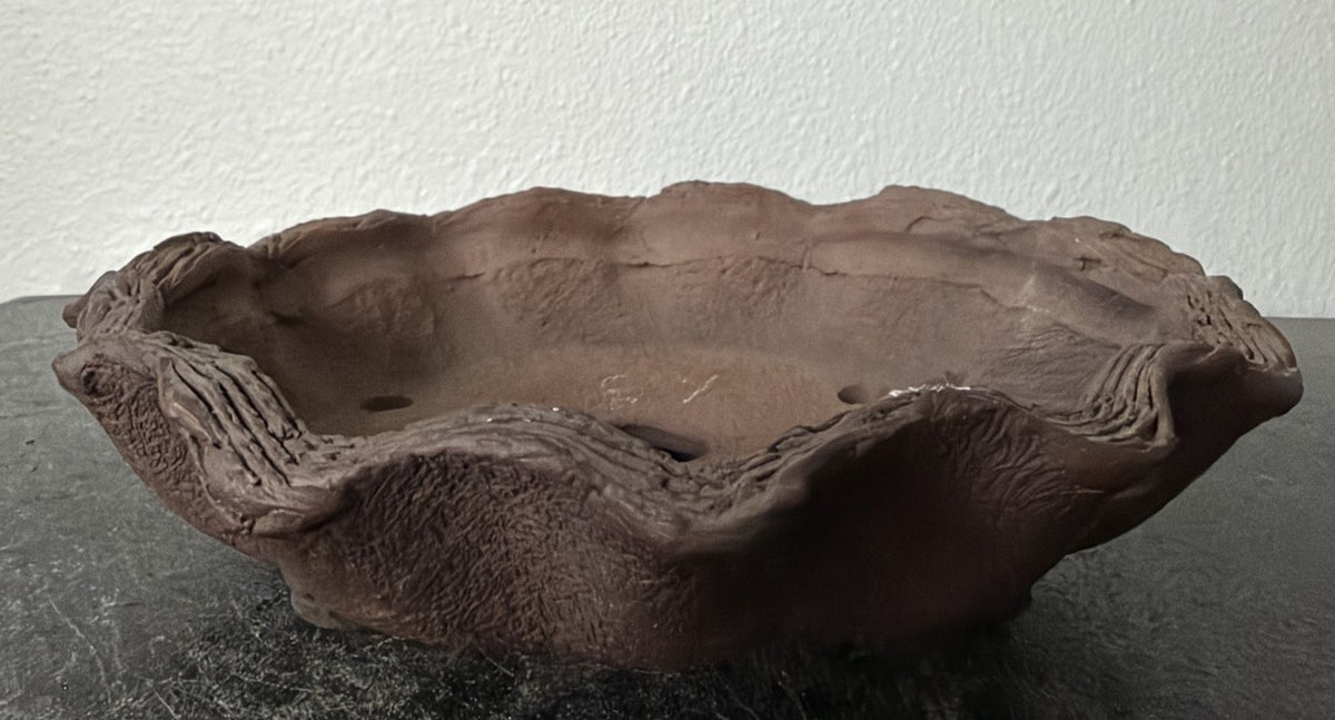 Ryugaku free-form round bonsai pot, front three-quarter view